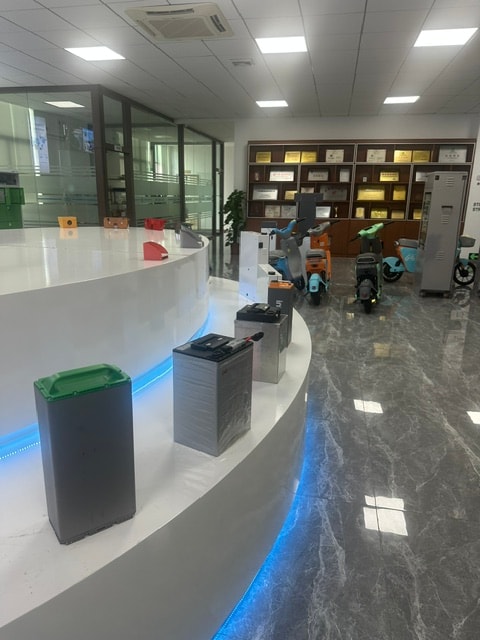 Battery showroom with multiple units on curved counter